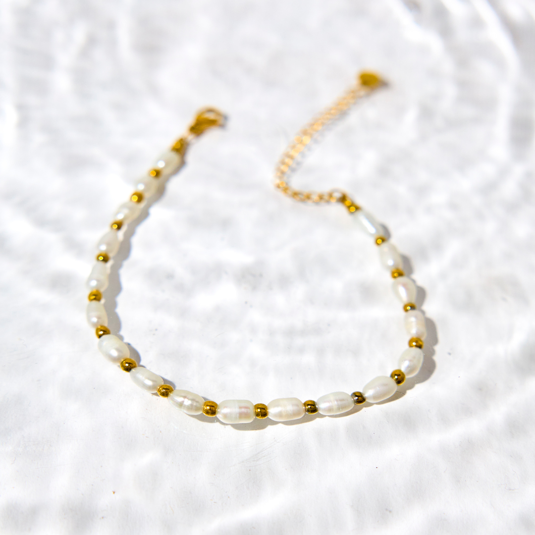 Armband met parels en bolletjes