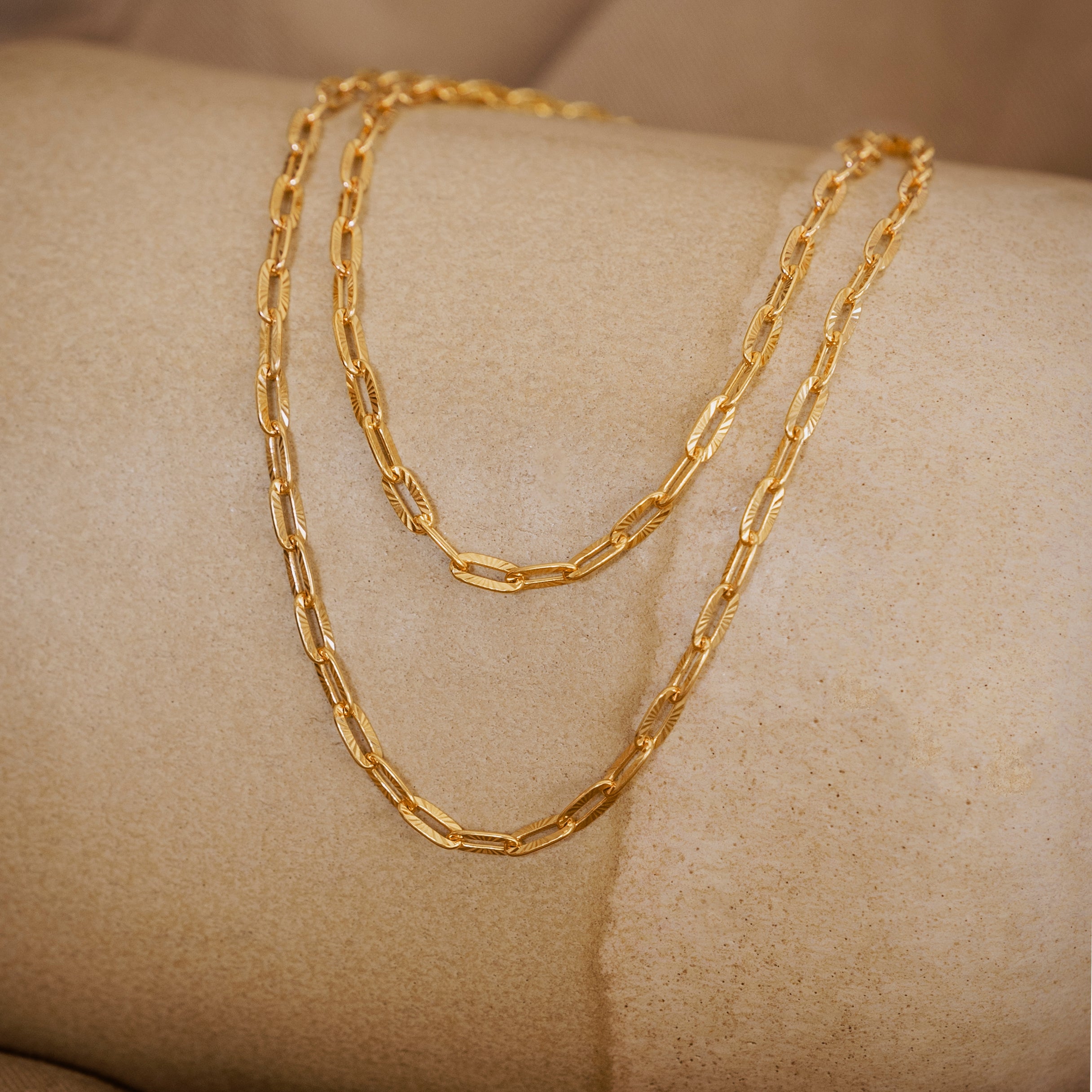 Ketting met zonmotief