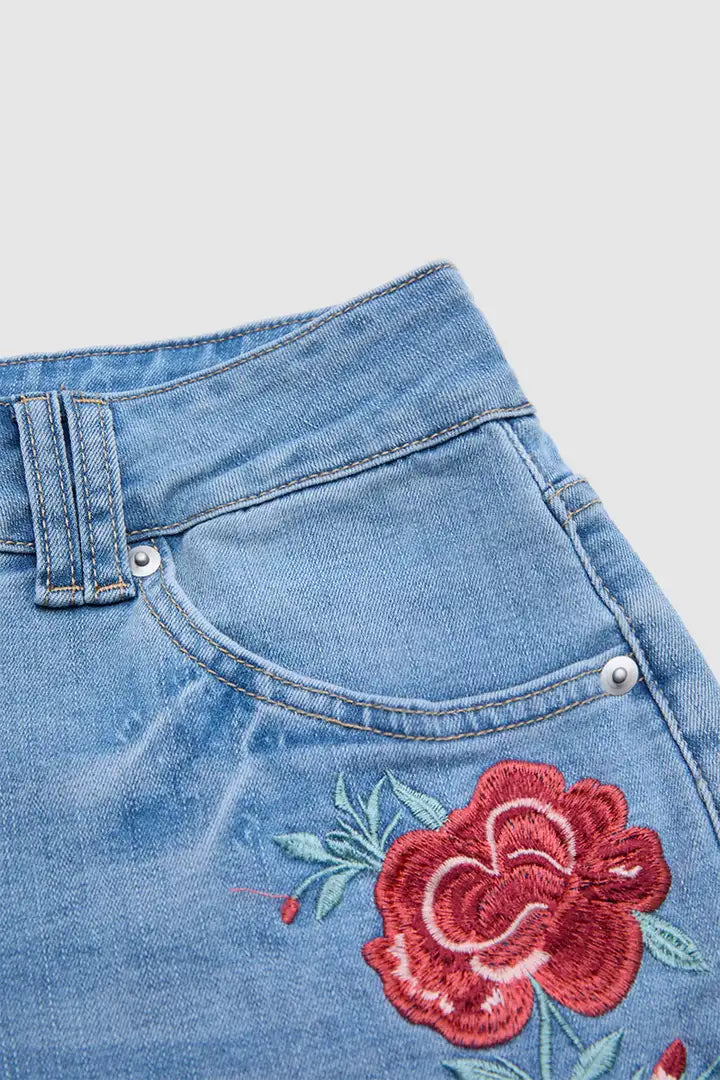 Lira - Denim broek met bloemenborduursel