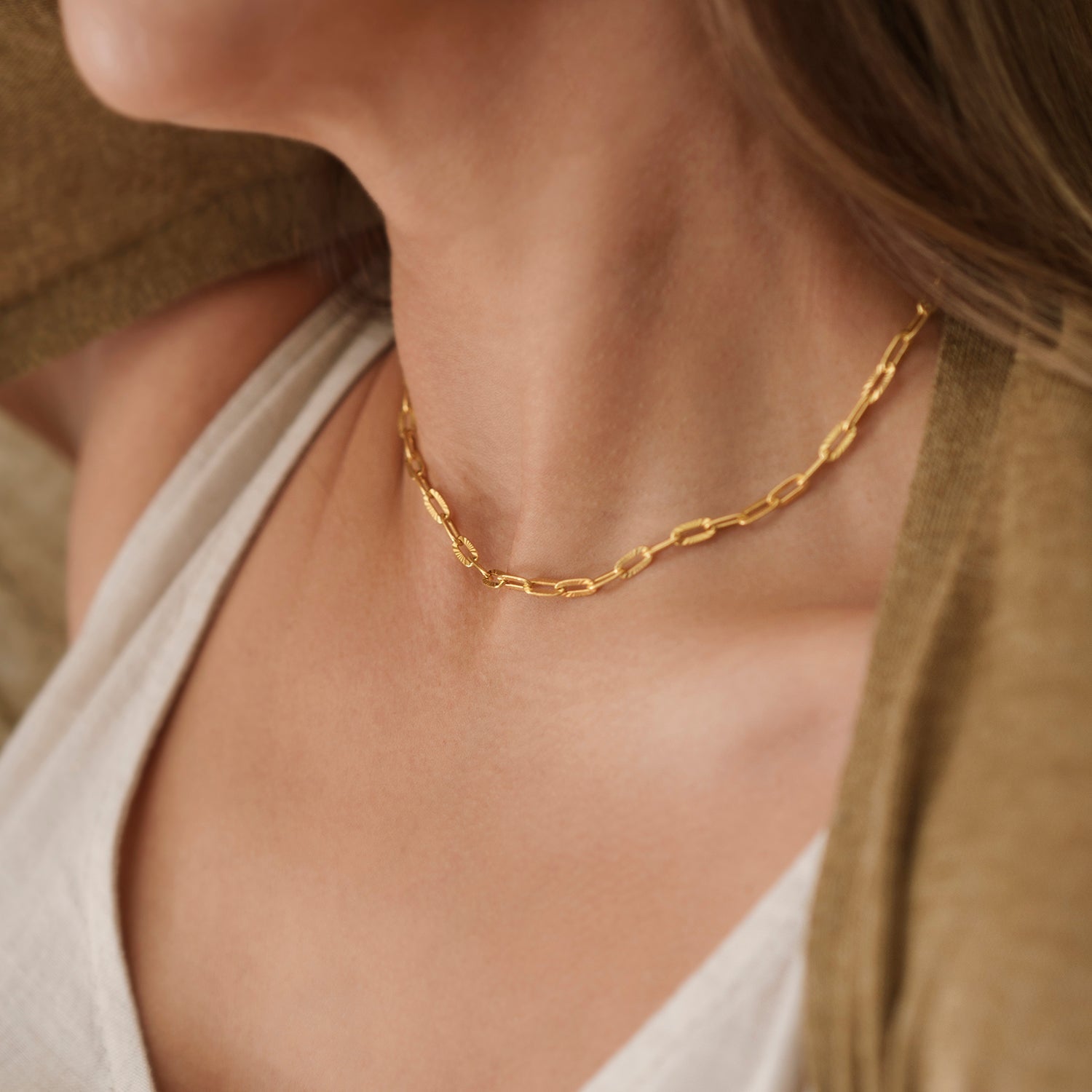 Ketting met zonmotief